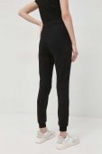 Бавовняні спортивні штани Armani Exchange жіночі колір чорний з аплікацією