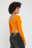 Бавовняний лонгслів Only колір помаранчевий