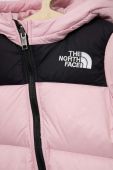 Пуховий комбінезон для немовлят The North Face колір рожевий