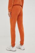 Спортивні штани Guess жіночі колір помаранчевий з аплікацією (2666167)