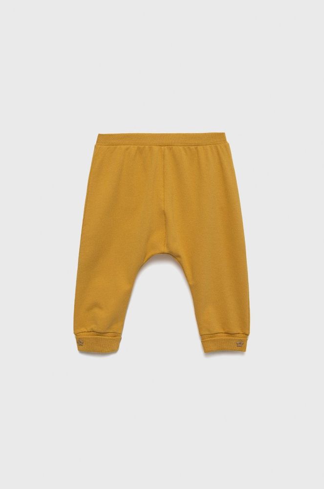 Дитячі спортивні штани United Colors of Benetton колір жовтий однотонні (2538987)