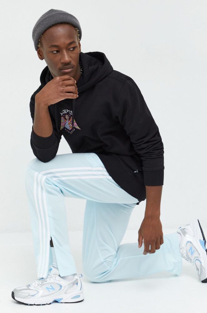 Спортивні штани adidas Originals чоловічі з аплікацією колір блакитний (2743098)