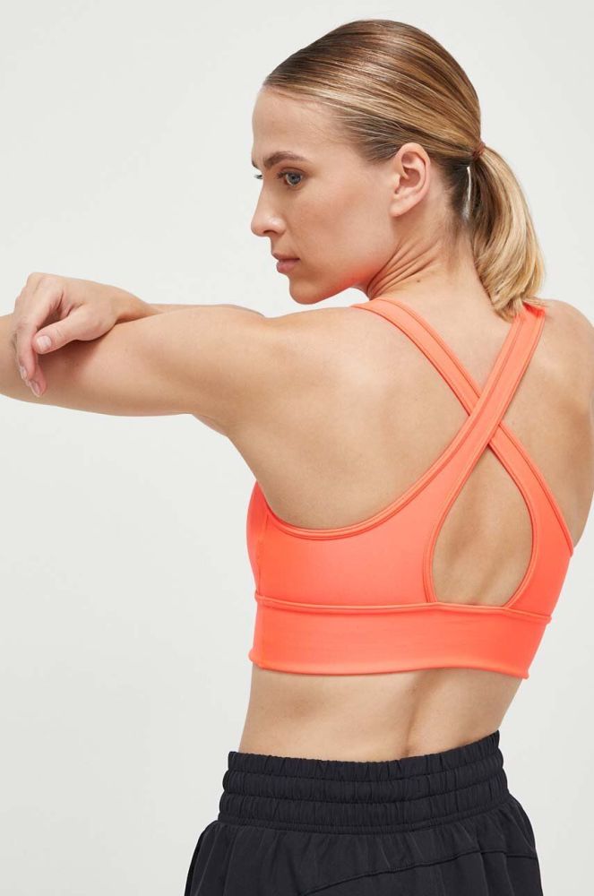 Спортивний бюстгальтер Under Armour Crossback колір помаранчевий однотонний