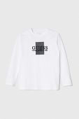 Дитячий бавовняний лонгслів Guess колір білий з принтом (3559468)