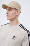 Бавовняний лонгслів adidas Originals колір бежевий з аплікацією