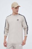 Бавовняний лонгслів adidas Originals колір бежевий з аплікацією