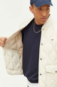 Пухова куртка Tommy Jeans чоловіча колір бежевий перехідна (3284174)