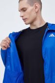 Вітровка adidas Performance Own the Run перехідна колір блакитний