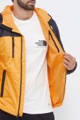 Куртка The North Face чоловіча колір жовтий перехідна