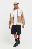 Двостороння куртка Tommy Jeans чоловіча колір бежевий перехідна