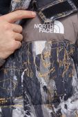 Пухова куртка The North Face чоловіча зимова колір блакитний