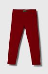 Дитячі легінси United Colors of Benetton колір червоний однотонні (3394518)