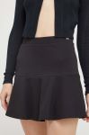 Спідниця Tommy Jeans колір чорний mini розкльошена (3394737)