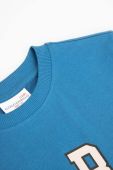Дитяча бавовняна футболка Coccodrillo з принтом колір блакитний (3495816)