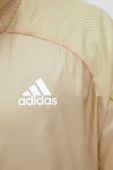 Вітровка adidas Performance колір бежевий перехідна