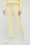 Спортивні штани Peak Performance жіночі колір жовтий однотонні