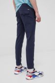 Штани Tommy Jeans чоловіче колір синій фасон jogger