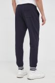 Штани Guess чоловічі колір синій гладке