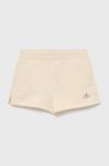 Дитячі шорти Champion 404334 колір бежевий однотонні