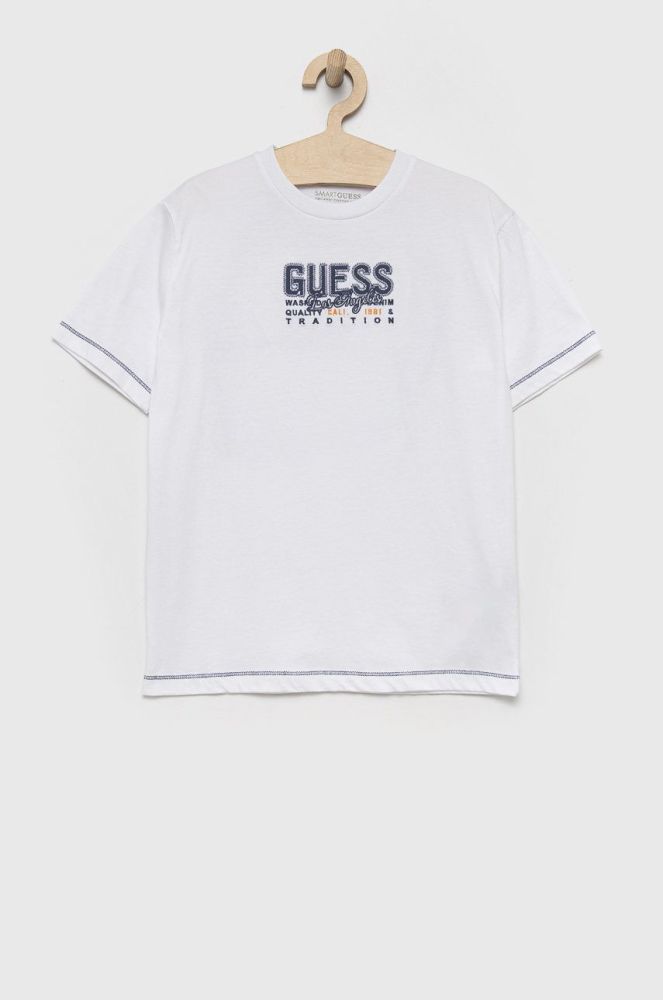 Дитяча бавовняна футболка Guess колір білий з принтом (2054170)