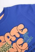 Дитячий бавовняний лонгслів Coccodrillo колір синій з принтом
