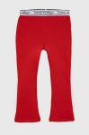 Дитячі легінси Tommy Hilfiger колір червоний однотонні