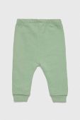 Дитячі бавовняні штанці United Colors of Benetton колір зелений однотонні (2980252)