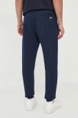 Бавовняні спортивні штани Lacoste колір синій меланж