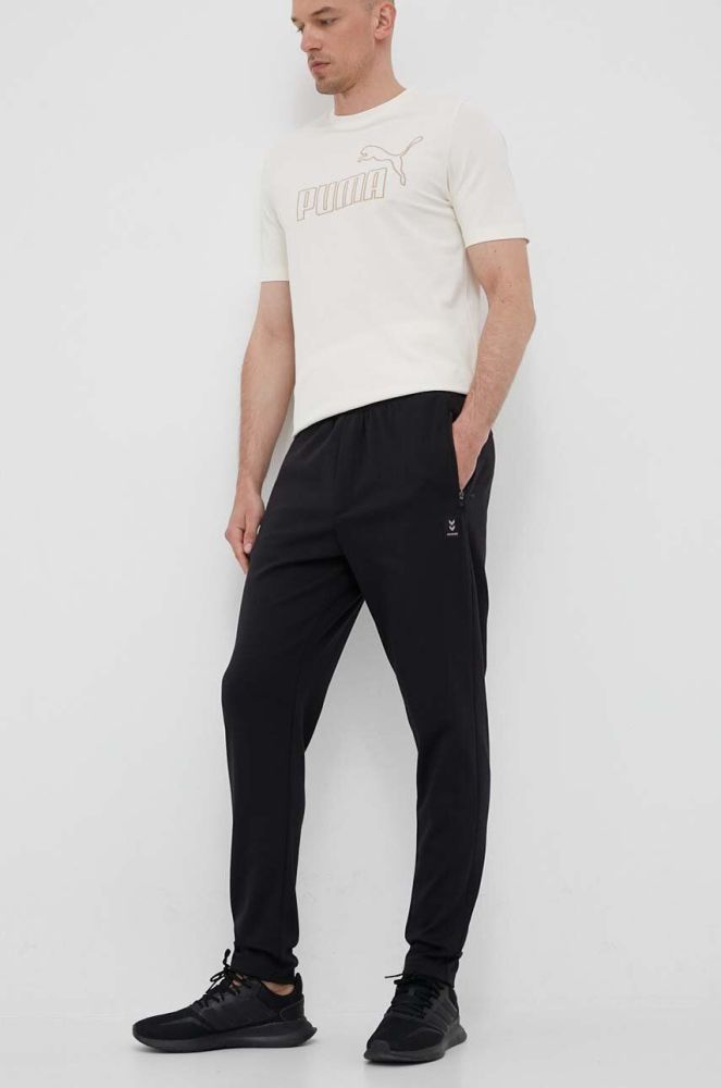 Спортивні штани Hummel Interval колір чорний однотонні