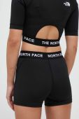 Шорти для тренувань The North Face колір чорний з принтом середня посадка