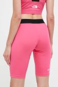 Спортивні шорти The North Face Mountain Athletics жіночі колір рожевий однотонні середня посадка