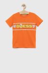 Дитяча бавовняна футболка Guess колір помаранчевий з принтом (3015493)
