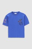 Дитяча бавовняна футболка Coccodrillo колір синій з принтом (3133529)