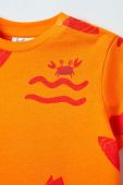 Бавовняна футболка для немовлят OVS колір помаранчевий візерунок