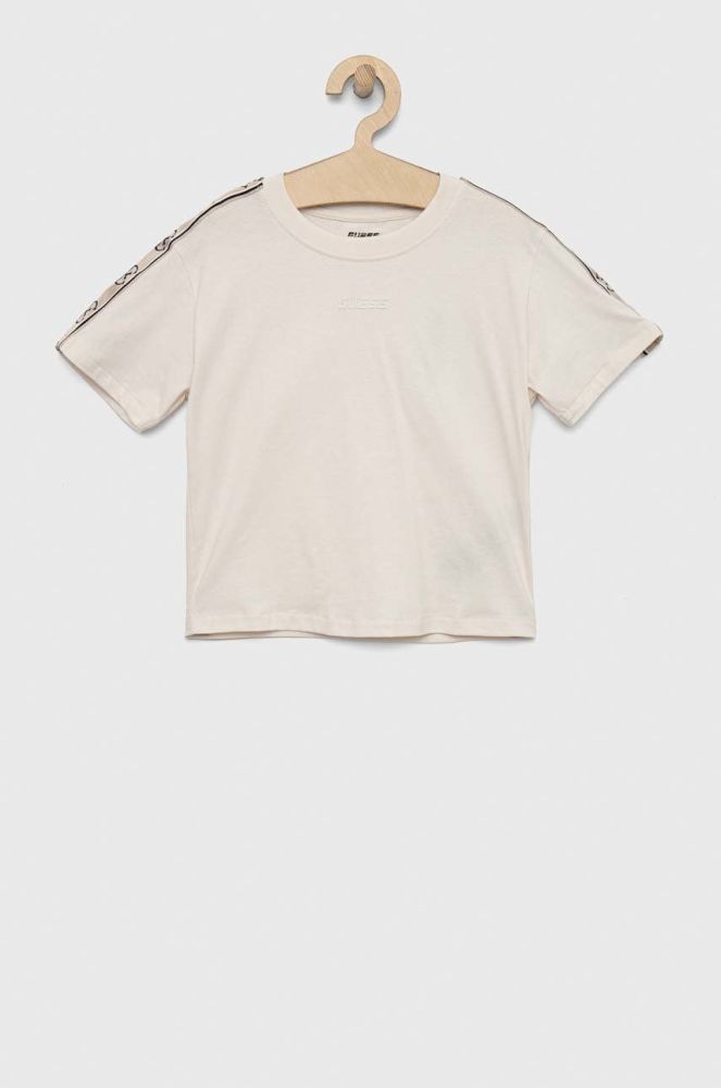 Дитяча бавовняна футболка Guess колір бежевий (2871465)