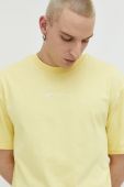 Бавовняна футболка Karl Kani колір жовтий з аплікацією (3091732)